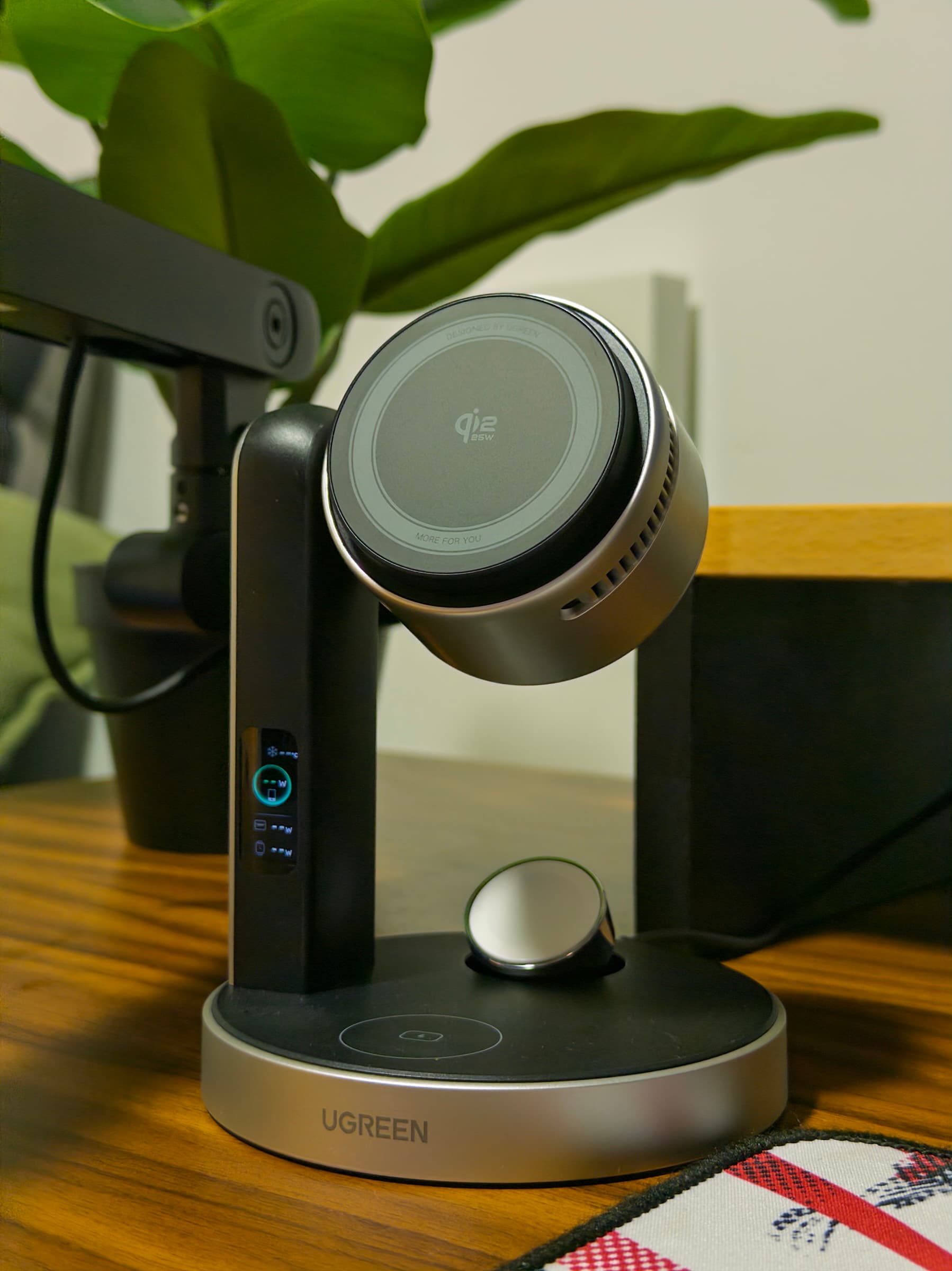 UGREEN MagFlow Pro charging stand on a wooden desk